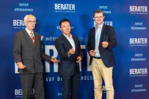 Julien Backhaus und Dr. Franz Hölzl auf der Berater Leben auf der Überholspur 3 Premiere